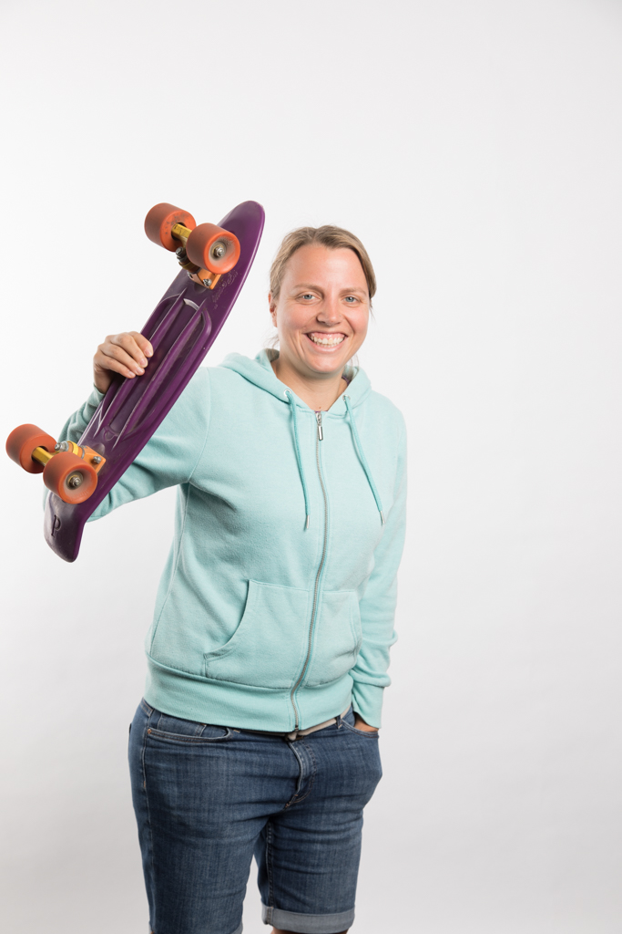 Profile image with me holding a purple penny board -Stefi